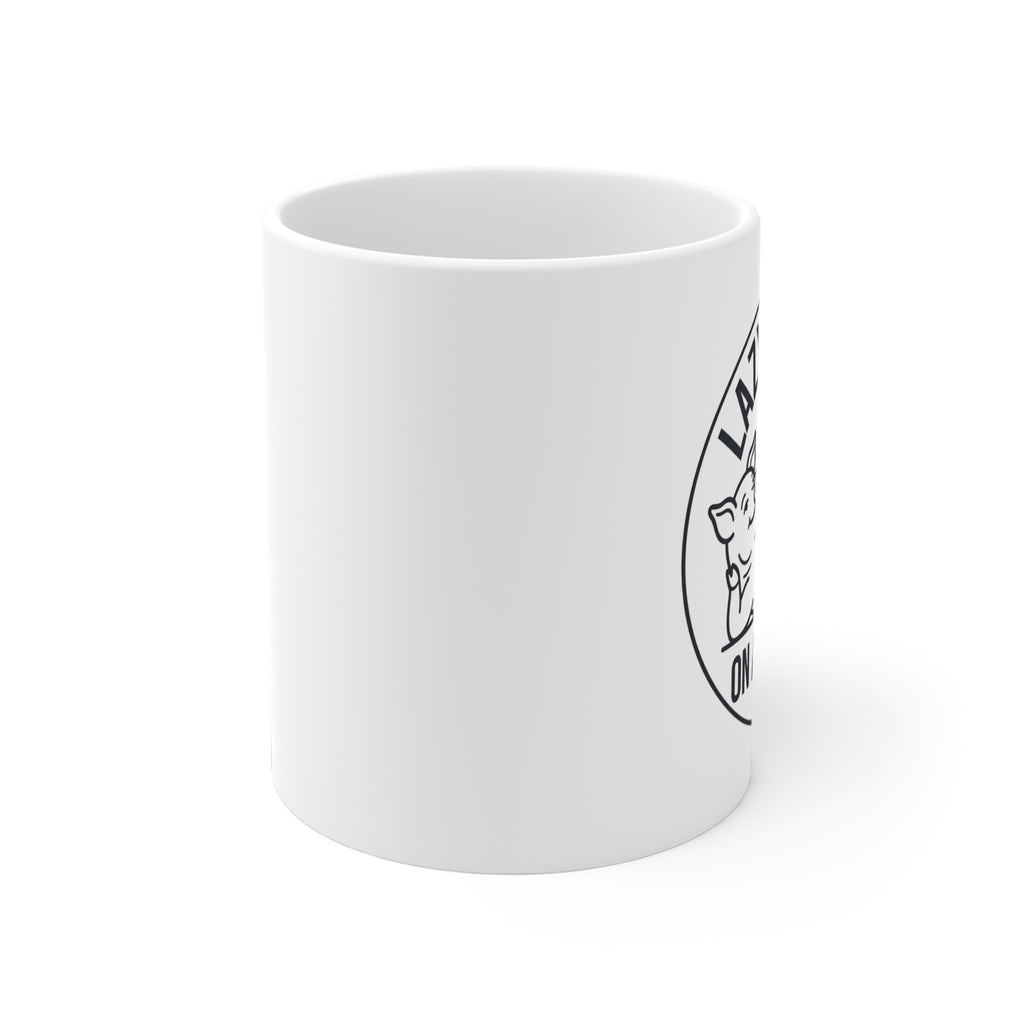White mug with black text on a white background